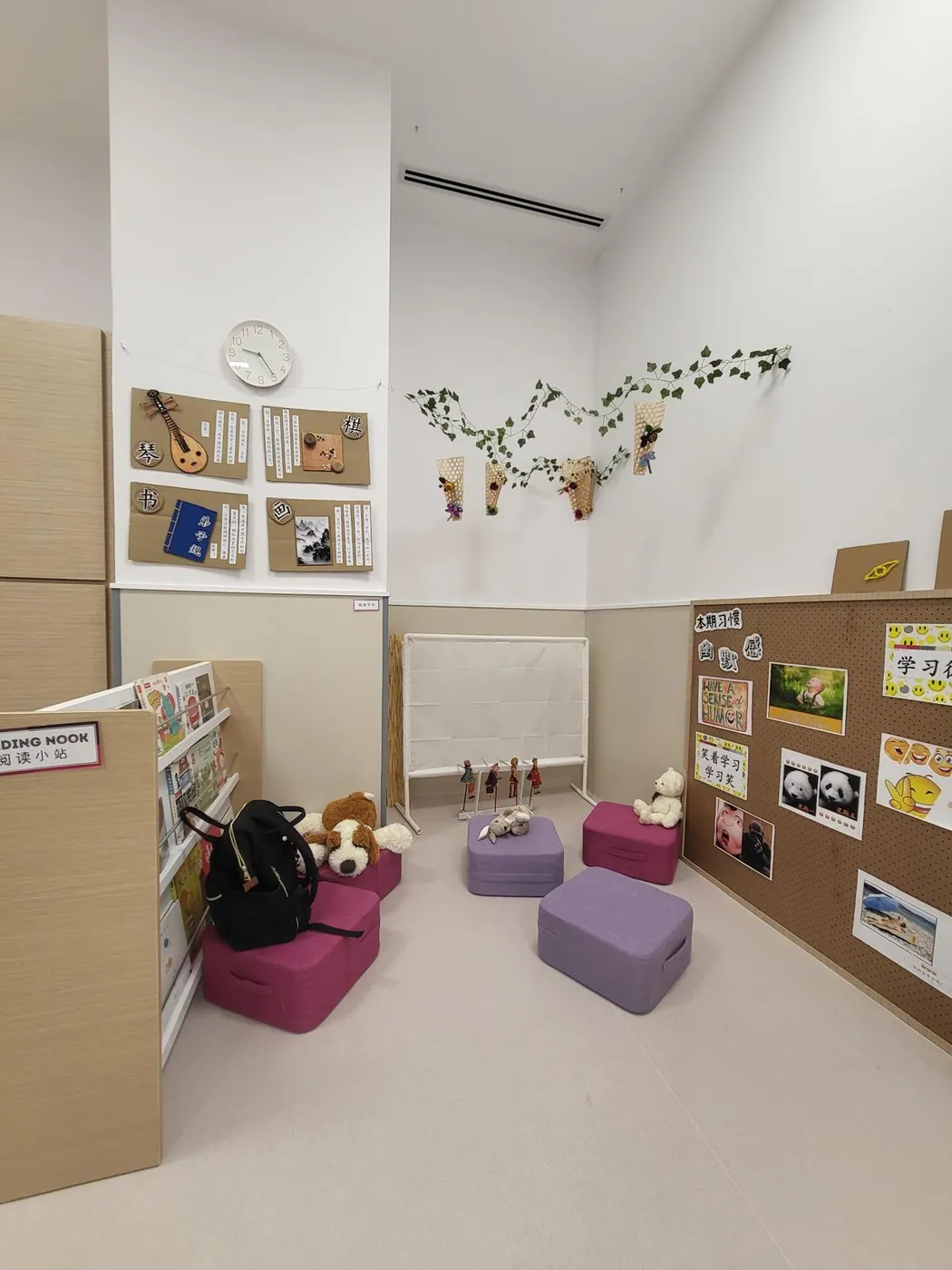A cosy reading nook with picture books and Chinese cultural art